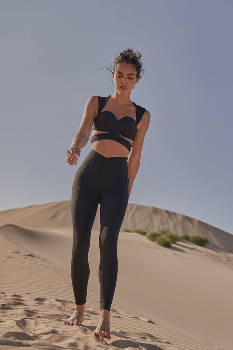 Model wears Elegant Corset Sports Bra | WISKII ACTIVE