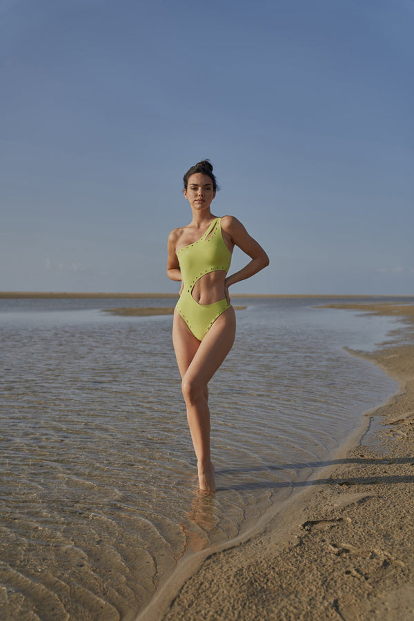 Model wears WISKII One Shoulder Laser Cut Swimsuit