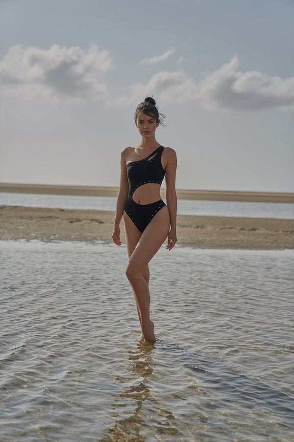 Model wears WISKII One Shoulder Laser Cut Swimsuit