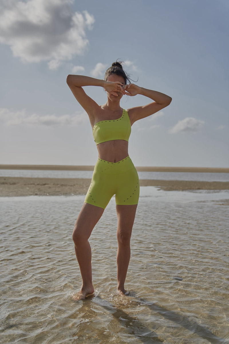 Model wears WISKII V-waist Laser Cut Sports Short