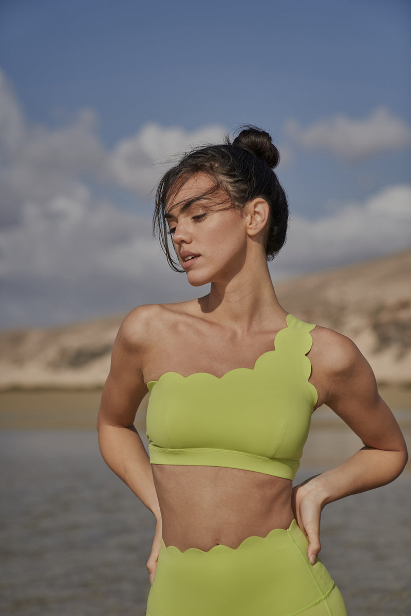 Model wears WISKII Dynamic One Shoulder Sports Bra