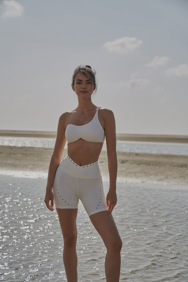 Model wears WISKII V-waist Laser Cut Sports Short