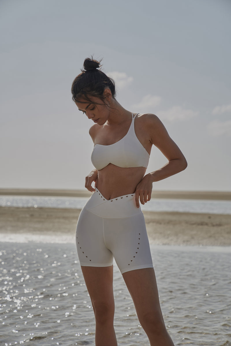 Model wears WISKII V-waist Laser Cut Sports Short