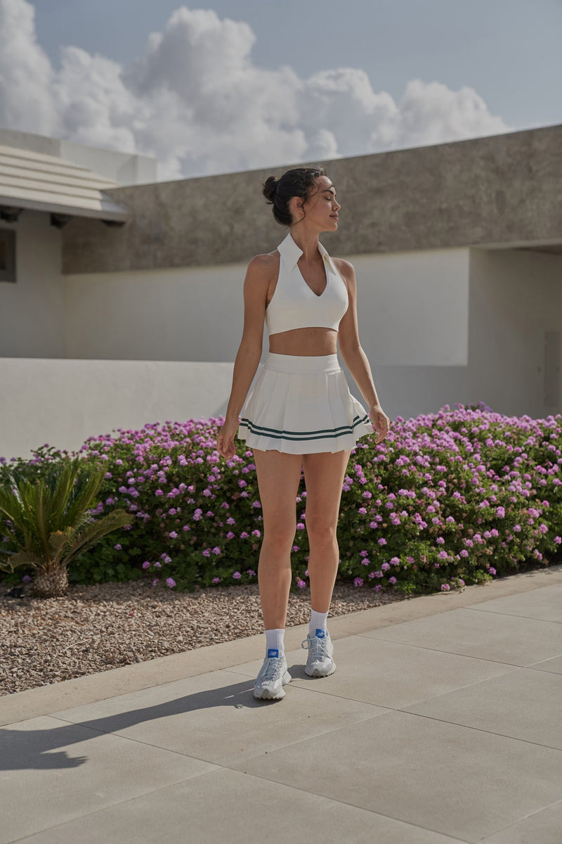 Model wears WISKII Varsity Tennis Skirt