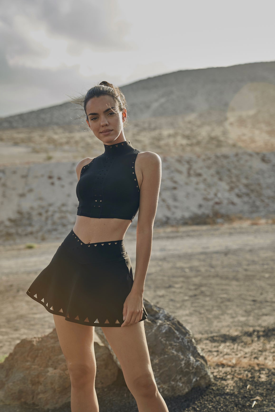 Model wears WISKII V-waist Laser Cut Tennis Skirt