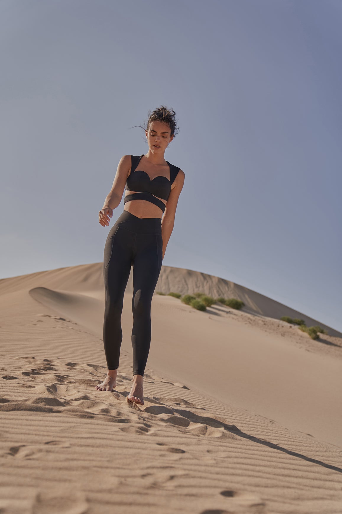 Model wears WISKII V-Waist Utility Legging