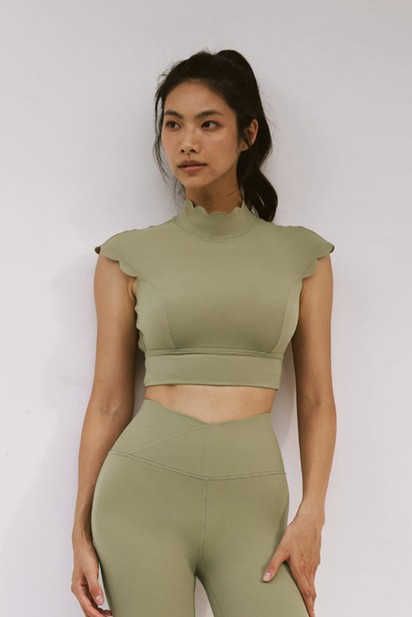 Model wears Scallop Cutout Mock Neck Bra | WISKII ACTIVE