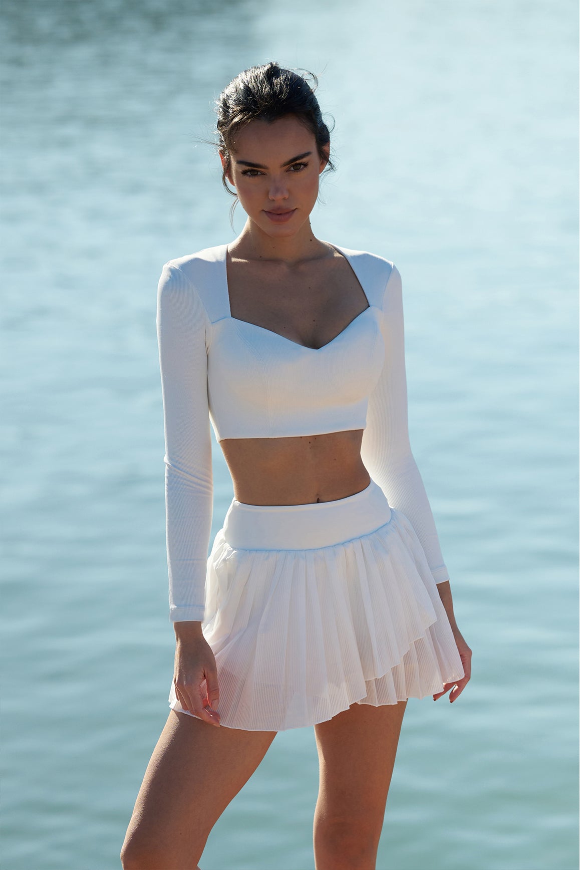 Model wears WISKII Elegant Long Sleeve Crop Top |  Ivory