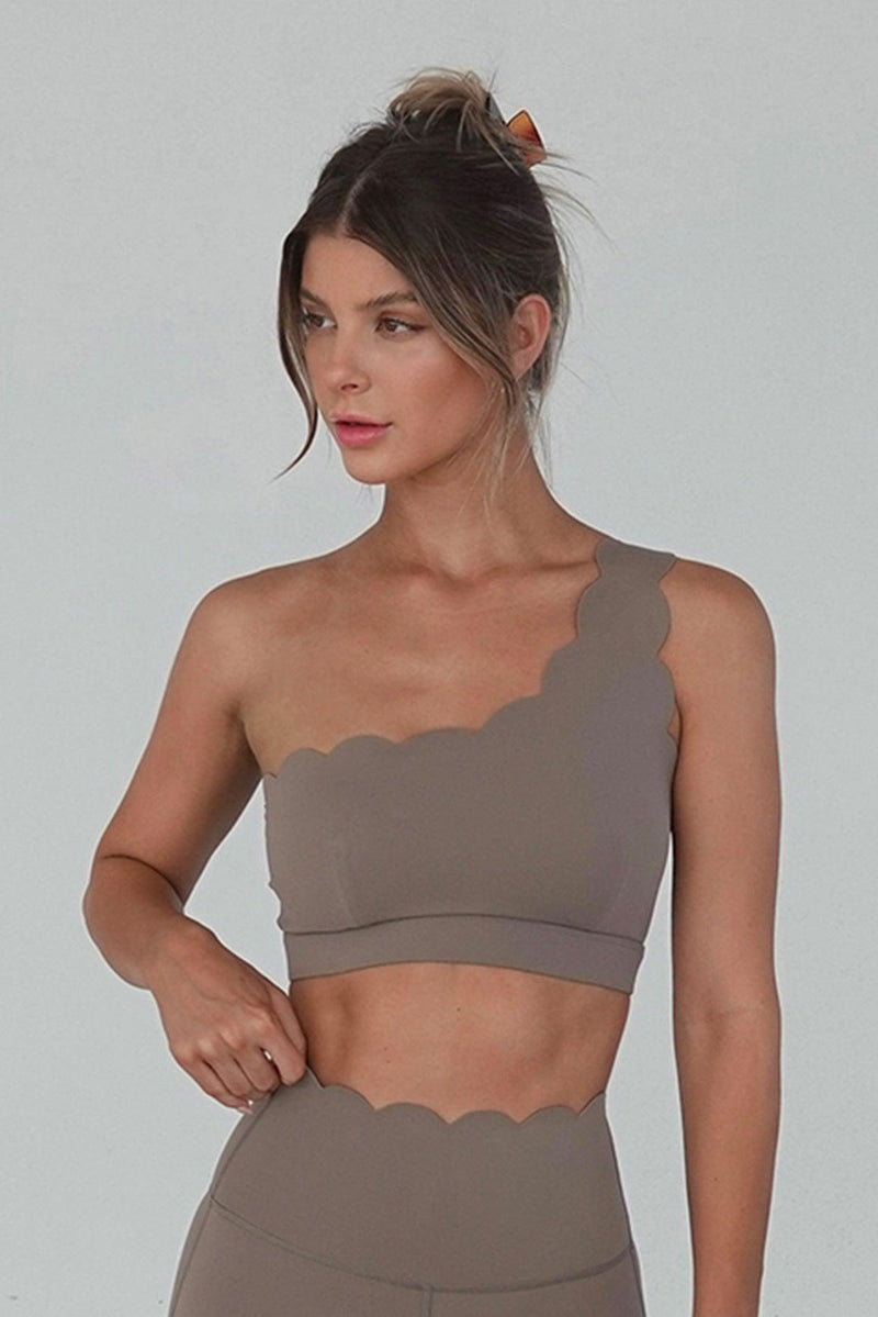 Model wears Dynamic One Shoulder Sports Bra + 7/8 High-Waist Energy Legging | WISKII