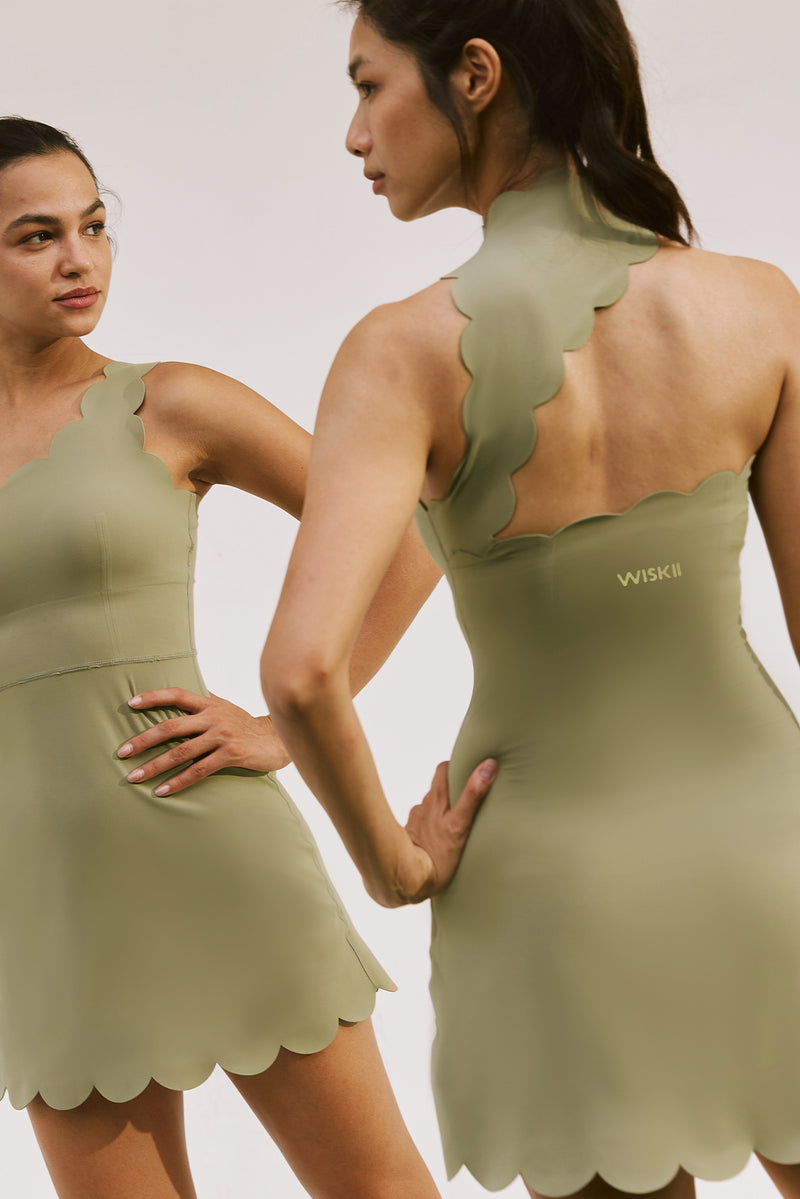 Model wears Scallop Back Mock Neck Dress | Muted Khaki | WISKII Active