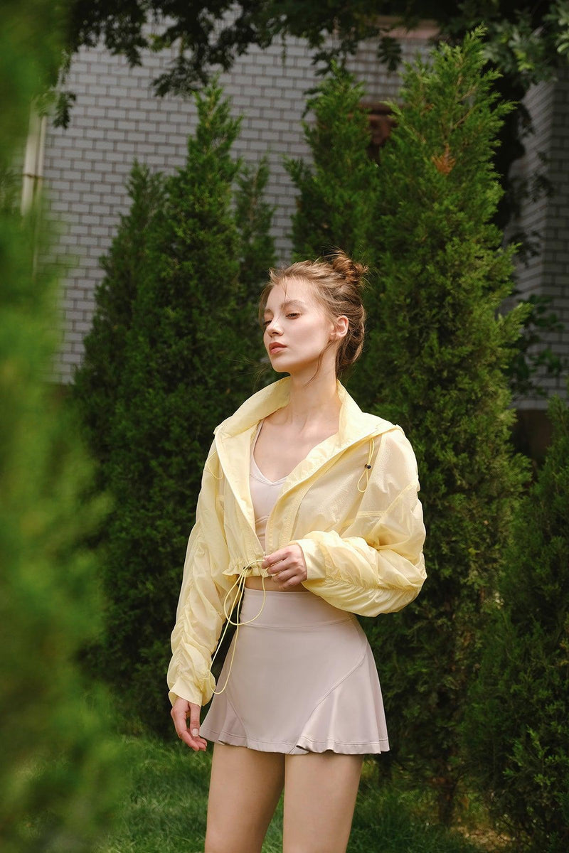 model wears a lite semi-formal jacket